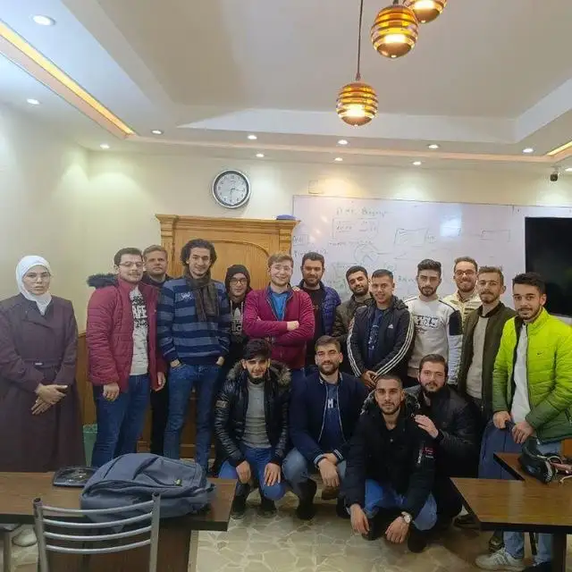 Celebrating student achievements during a CCNA course, focusing on networking fundamentals and hands-on problem-solving.